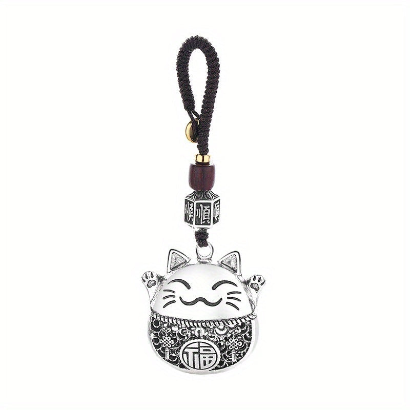 Essential accessories for both men and women with a minimalist ethnic design, including a Chinese-inspired lucky cat and copper coins to bring in prosperity, along with a whimsical cartoon cat pendant specially for the ladies.