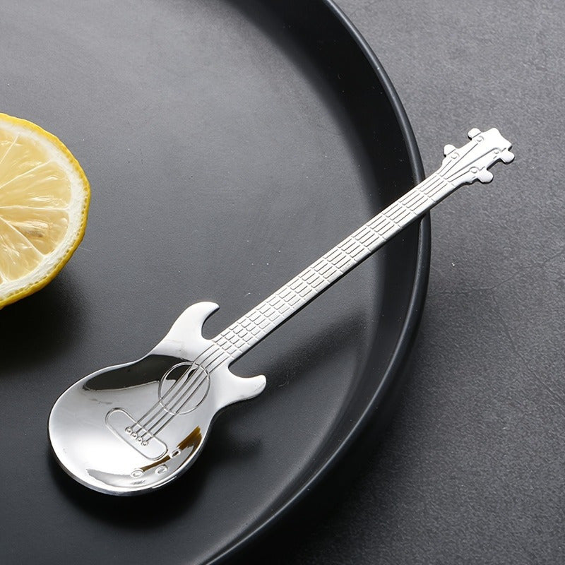 Stainless steel guitar-shaped spoon for coffee, tea, desserts, and ice cream. Perfect for kitchen accessories and supplies.