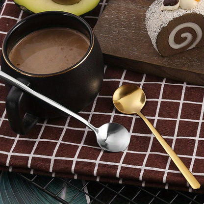 A trio of small round spoons made from durable stainless steel, featuring a luxurious golden finish. Ideal for stirring honey, coffee, and desserts. Makes a thoughtful gift or a stylish addition to your kitchen collection. Perfect for enjoying bird's