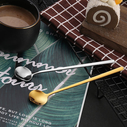 A trio of small round spoons made from durable stainless steel, featuring a luxurious golden finish. Ideal for stirring honey, coffee, and desserts. Makes a thoughtful gift or a stylish addition to your kitchen collection. Perfect for enjoying bird's