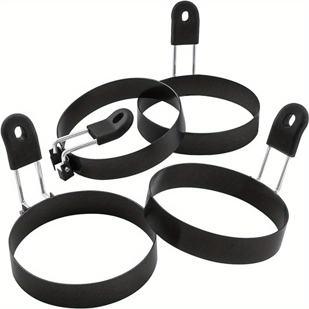 Set of 4 stainless steel egg rings that are non-stick and perfect for making circular muffins in the British style. Great for frying pancakes, portable for use in barbecues, and ideal for making breakfast sandwiches and burgers while camping. A must-have