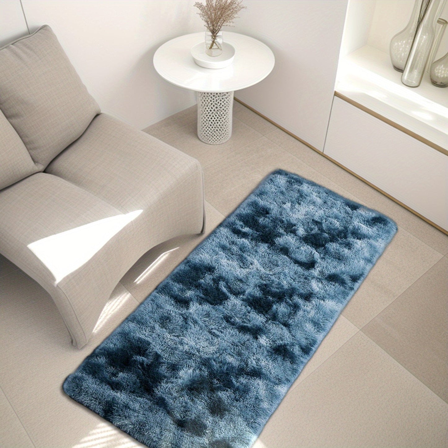 Indulge in luxury with our exquisite 1pc Tie-Dye Gradient Plush Area Mat. Made from soft silk fur, this machine washable mat is perfect for your living room coffee table or bedroom bedside. Available in two sizes: 50.01x100.0cm and 80.01x159.99cm. Cozy