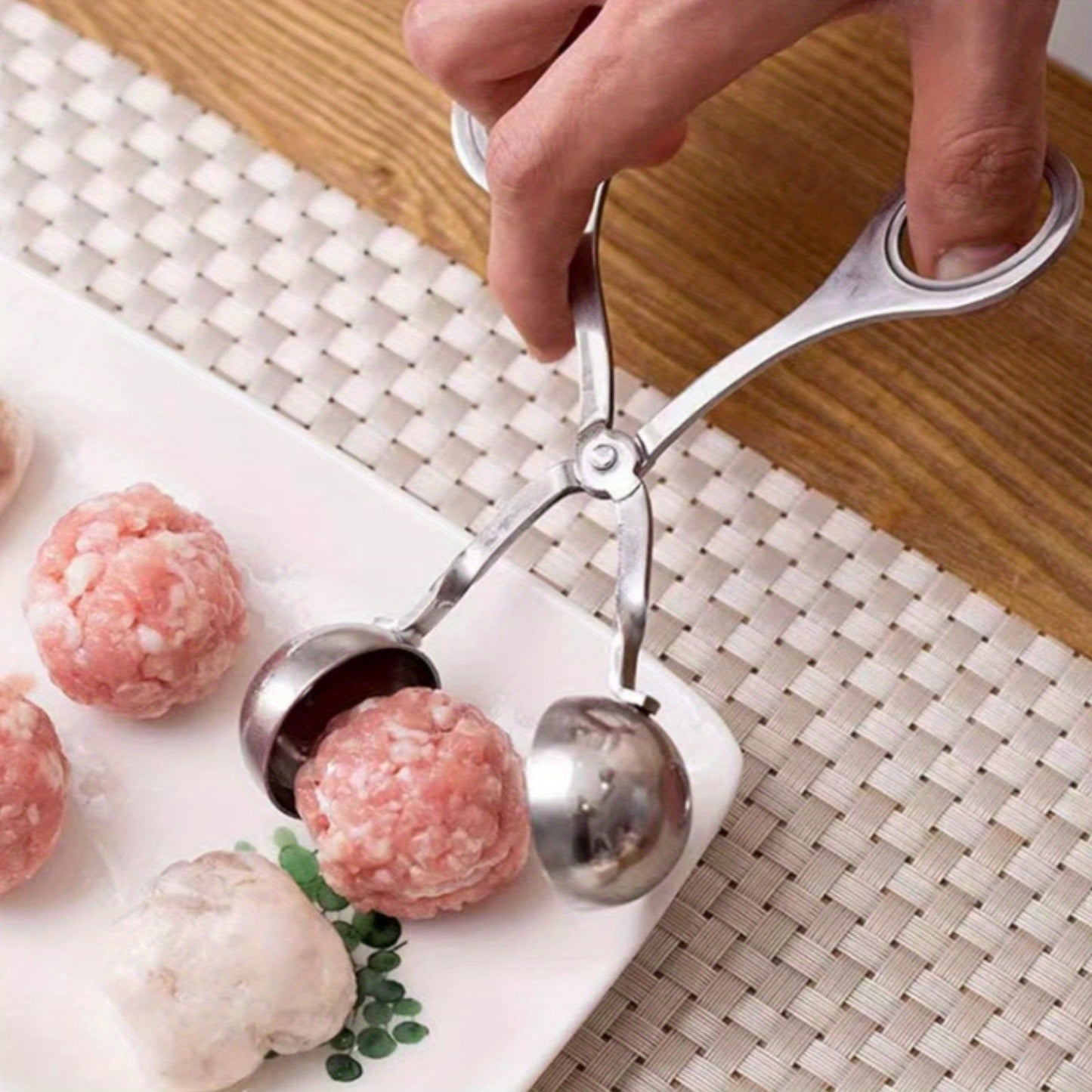 Stainless steel meat ballers with anti-slip handles for making meatballs, rice cakes, cookie dough scoops.