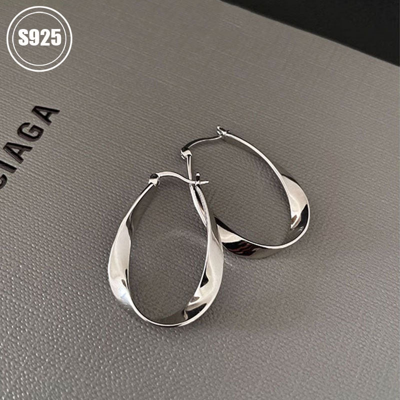 Get a set of two S925 Pure Silver Geometric Plain Circle Earrings featuring a unique design and high-end Mobius Ear Cuff. These earrings are perfect for giving to your girlfriend, friend, or family member. Each earring weighs 5.12g/0.18oz. Set includes