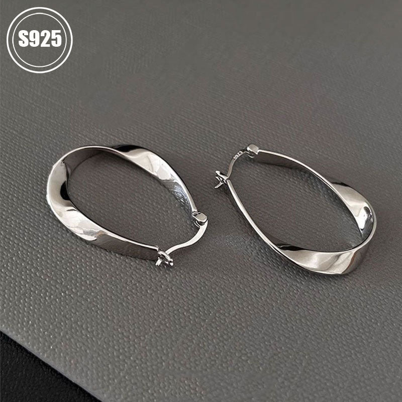 Get a set of two S925 Pure Silver Geometric Plain Circle Earrings featuring a unique design and high-end Mobius Ear Cuff. These earrings are perfect for giving to your girlfriend, friend, or family member. Each earring weighs 5.12g/0.18oz. Set includes