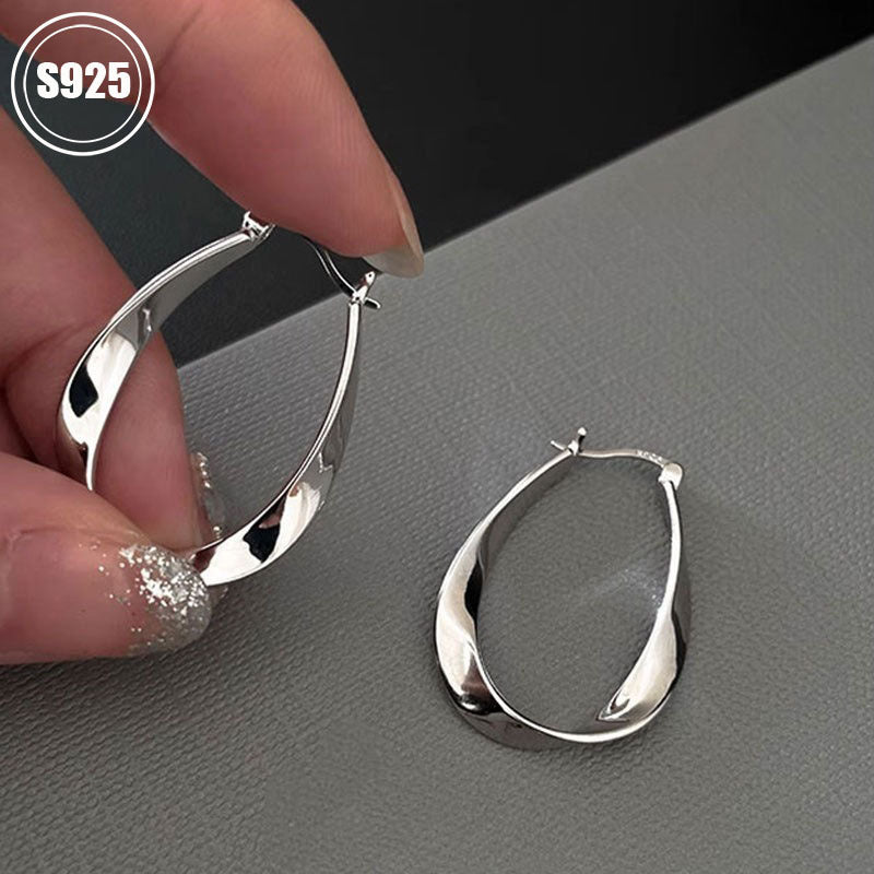 Get a set of two S925 Pure Silver Geometric Plain Circle Earrings featuring a unique design and high-end Mobius Ear Cuff. These earrings are perfect for giving to your girlfriend, friend, or family member. Each earring weighs 5.12g/0.18oz. Set includes