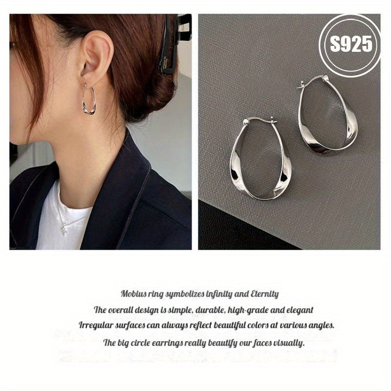 Get a set of two S925 Pure Silver Geometric Plain Circle Earrings featuring a unique design and high-end Mobius Ear Cuff. These earrings are perfect for giving to your girlfriend, friend, or family member. Each earring weighs 5.12g/0.18oz. Set includes