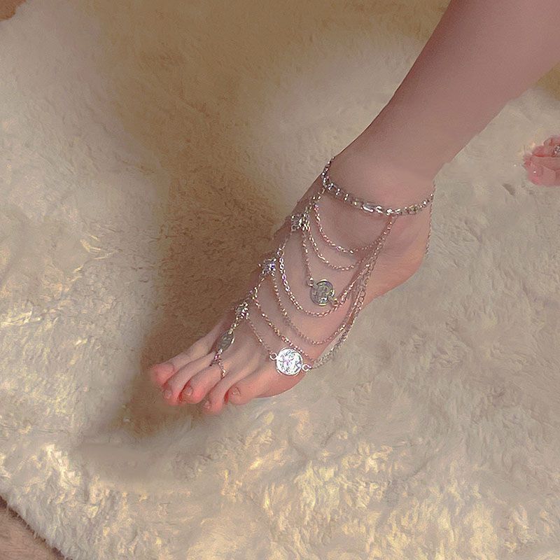 Beautiful and Alluring Foot Chain Tassel Anklet with Toe Ring, featuring Exotic Retro Style with Metal Coin Pendant and Elegant Court Design, perfect for a touch of glamour and sophistication in your jewelry collection.