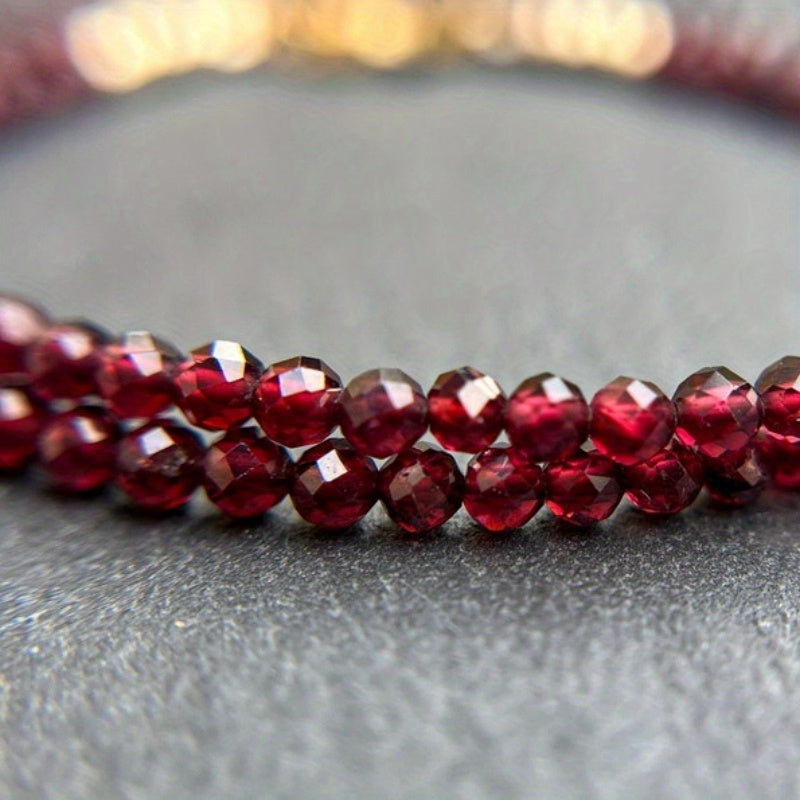 A delicate AAA red garnet beaded necklace measuring 3mm or 0.12 inches, featuring bright red gemmy micro-faceted garnet stones. This dainty January birthstone crystals necklace is perfect for daily wear and versatile fashion.