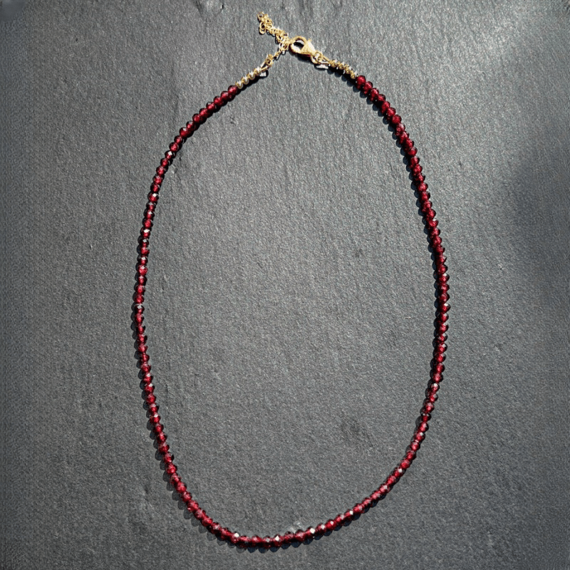 A delicate AAA red garnet beaded necklace measuring 3mm or 0.12 inches, featuring bright red gemmy micro-faceted garnet stones. This dainty January birthstone crystals necklace is perfect for daily wear and versatile fashion.