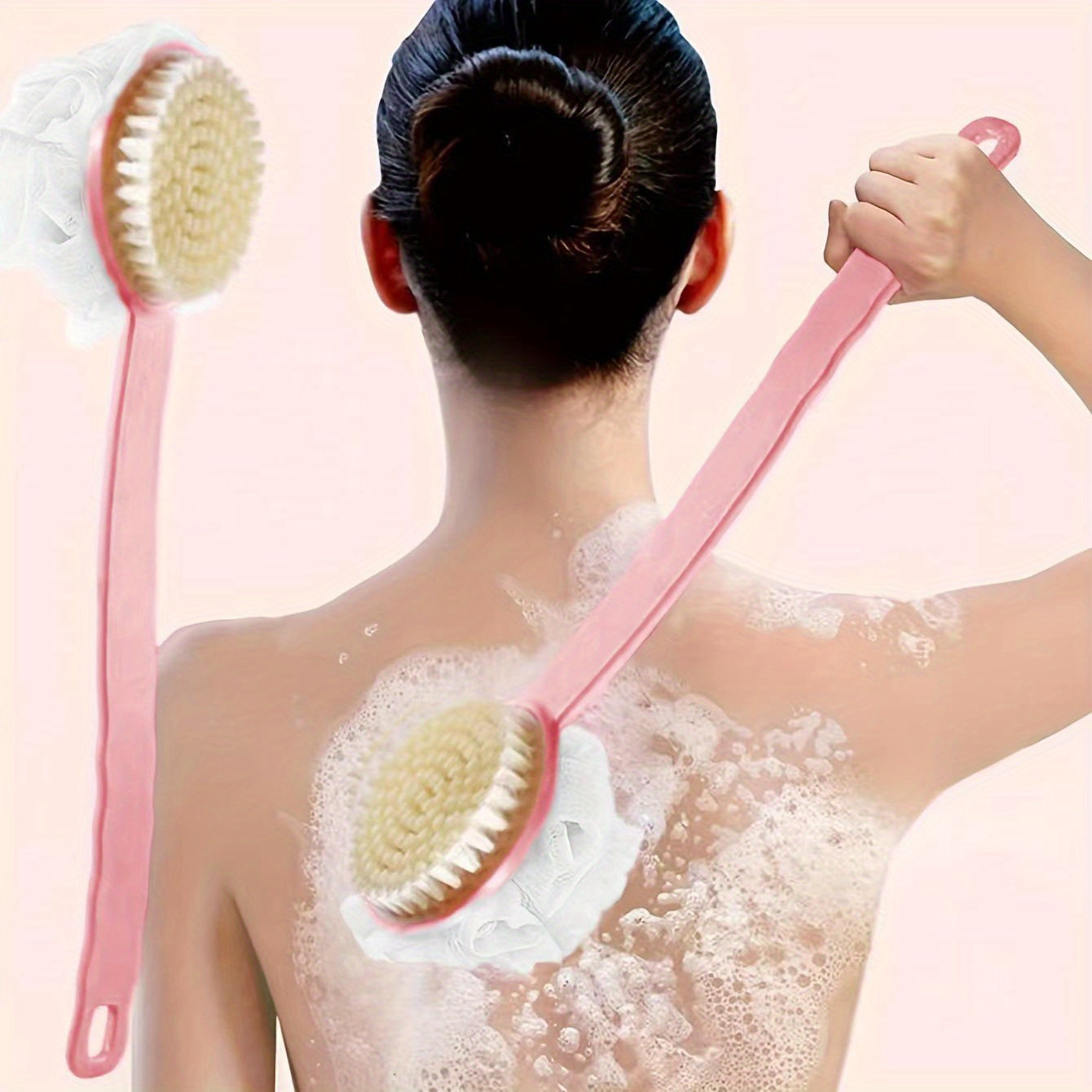 Long handled bath brush with soft bristles, ergonomic grip, and dual function for gentle exfoliation and relaxing showers.