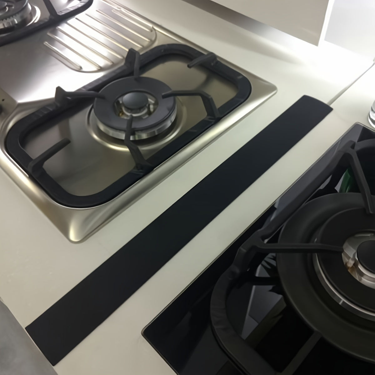 Protect your kitchen stove with the 1pc Counter Gap Cover. This anti-spill, oil and grease-proof sealing strip is perfect for gas ranges. It is easy to clean, heat-resistant, waterproof, dustproof, and blocks out dirt. Keep your home safe and clean with