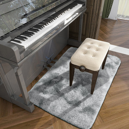 Soft and luxurious long plush silk fleece rectangular carpet rug, featuring a Nordic style design with a tie-dye gradient color scheme. The non-slip bottom ensures safety, while the soft and comfortable shaggy carpet is non-shedding. This stylish machine