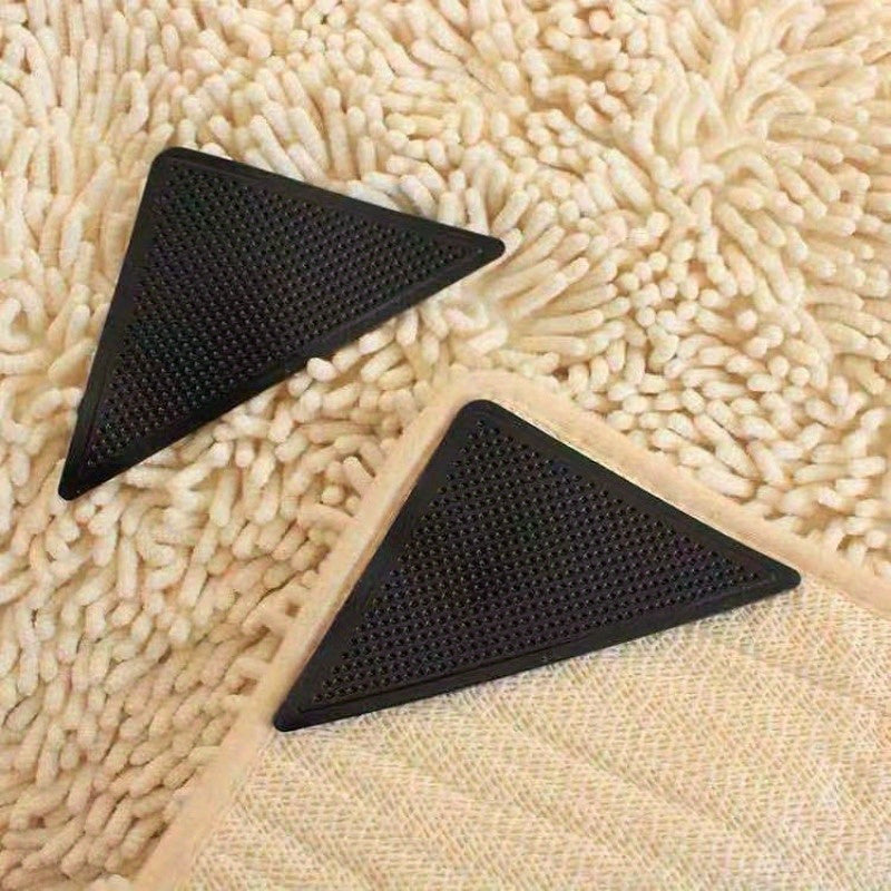 Get 4 pieces of Grippers for Rugs, designed to prevent slipping on hardwood floors and tiles. These reusable and washable rug stickers can be used on carpets, with dual-sided adhesive rug pads to keep corners flat.