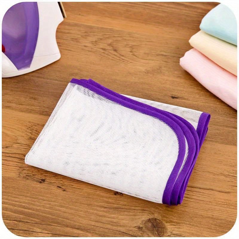 Heat-resistant ironing mesh pad for household use.