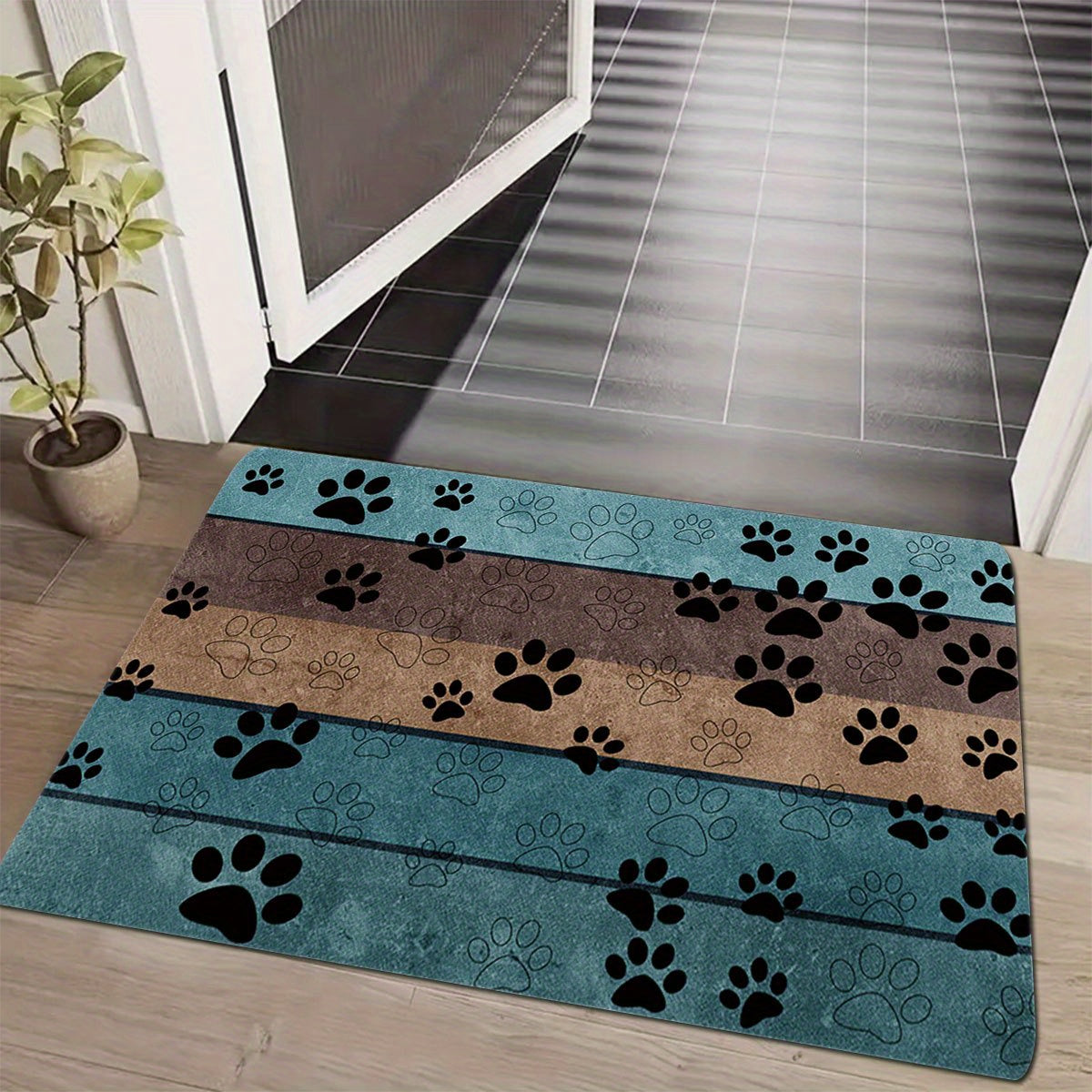 Introducing "Whisker Welcome", a playful animal paw print welcome mat designed to greet you and your guests with a smile. This durable, non-slip rug is perfect for any space in your home - from the living room to the kitchen. Machine washable and highly