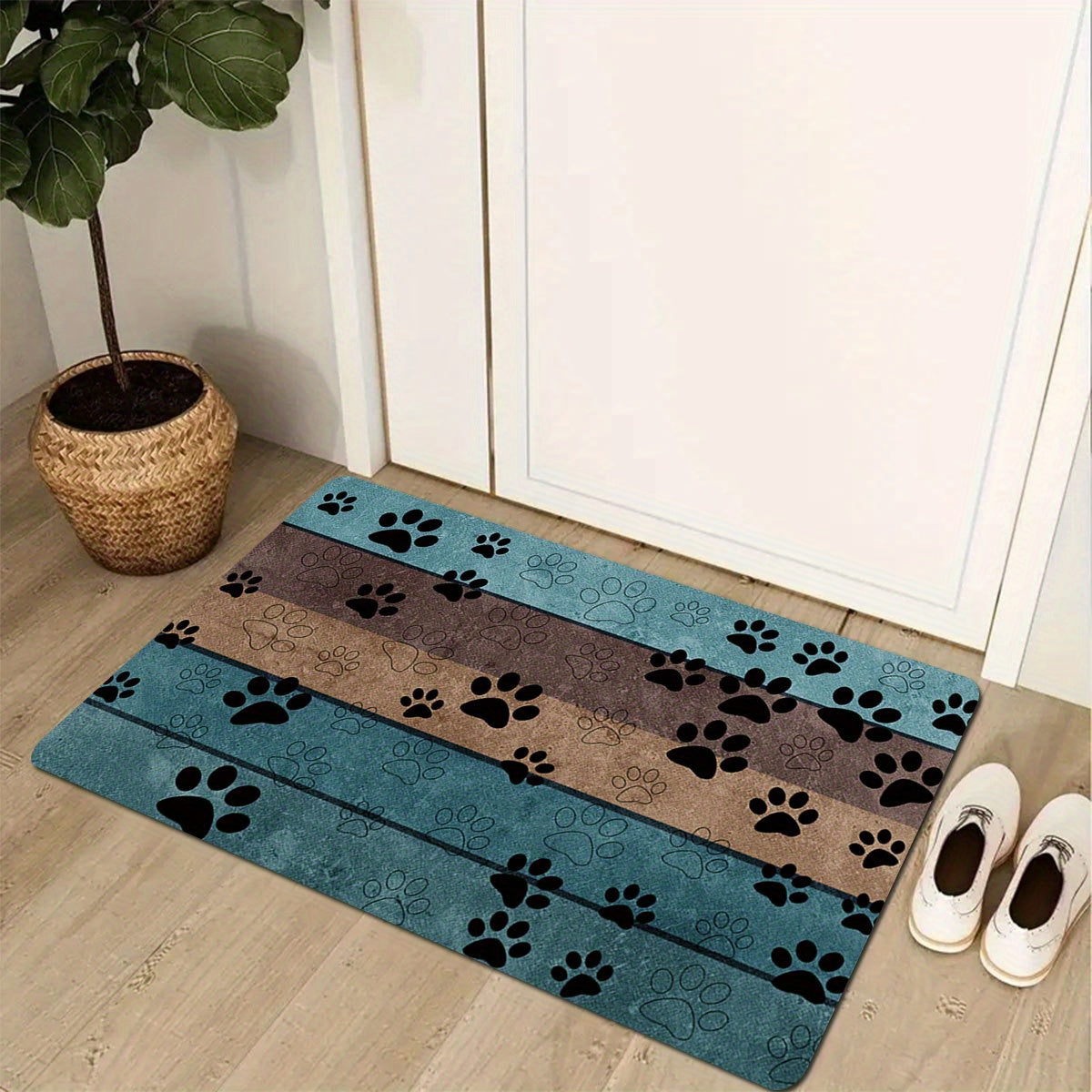 Introducing "Whisker Welcome", a playful animal paw print welcome mat designed to greet you and your guests with a smile. This durable, non-slip rug is perfect for any space in your home - from the living room to the kitchen. Machine washable and highly