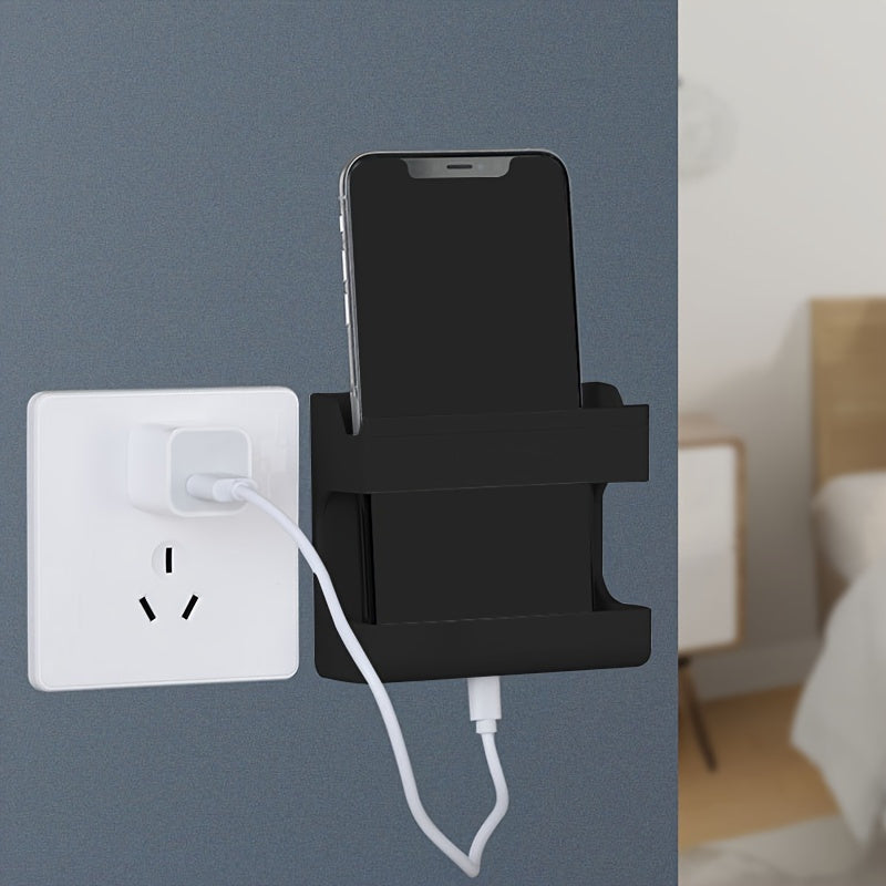 Wall-mounted storage bracket for phones and remotes, no drilling required.