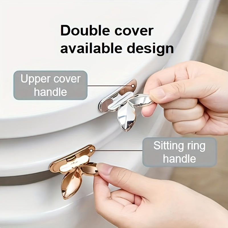 2 durable plastic toilet seat lifters with high-gloss finish, self-adhesive mount, and reusable - essential household accessory.