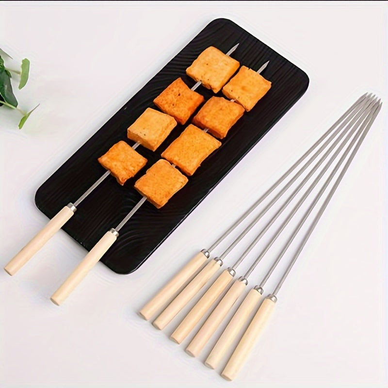 20 pieces of stainless steel barbecue skewers with wooden handles, perfect for grilling and outdoor cooking. These multifunctional metal BBQ skewers are essential for any BBQ enthusiast's supplies.