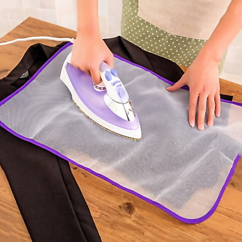 Protect your clothes from heat damage with the Heat Resistant Ironing Net Mat - the perfect home accessory for steam ironing.