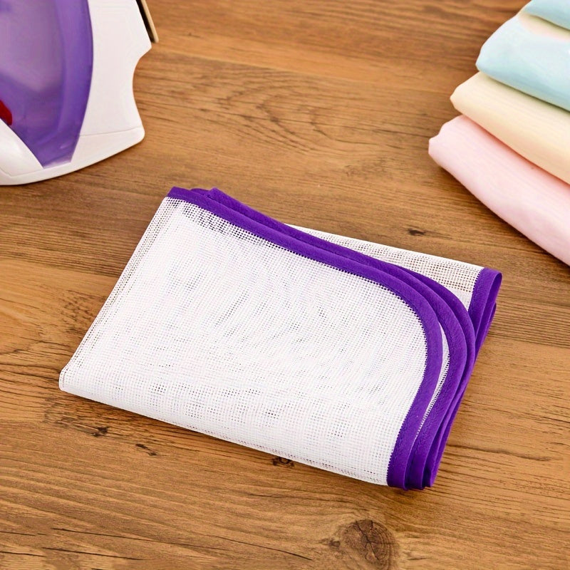 Protect your clothes from heat damage with the Heat Resistant Ironing Net Mat - the perfect home accessory for steam ironing.