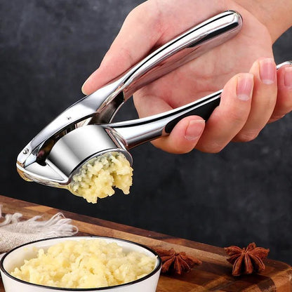 A multifunctional stainless steel garlic press that can be used as a garlic mincer, crusher, chopper, squeezer, masher, and more. Washable and great for use in the kitchen, this gadget is a must-have for any cooking enthusiast.