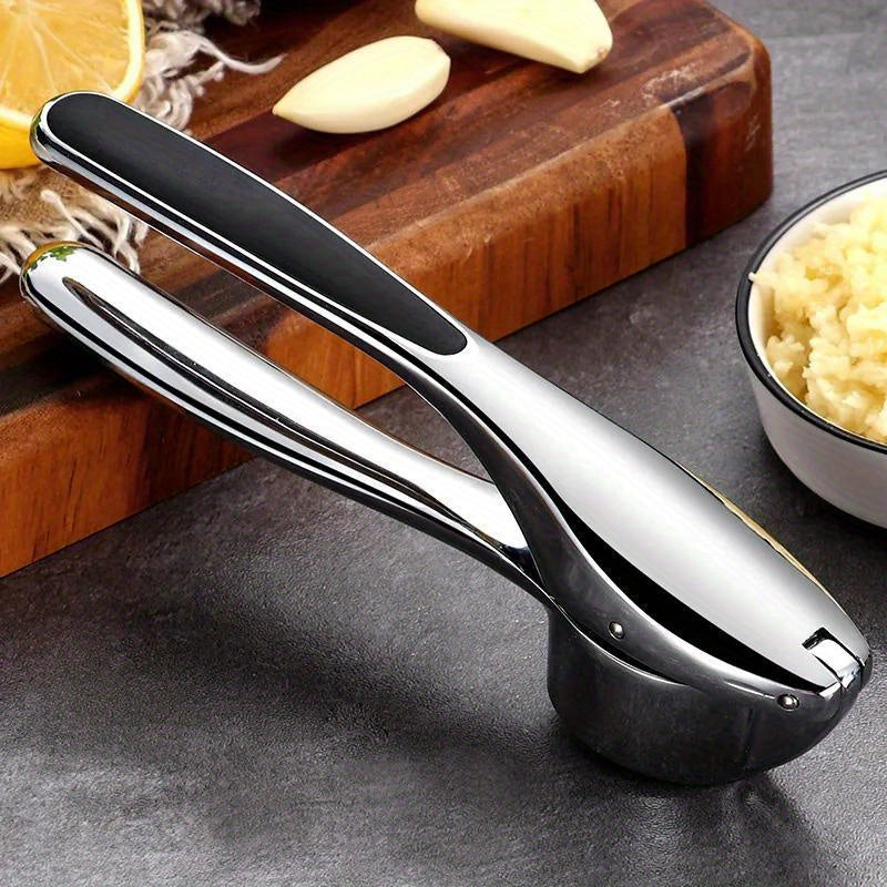 A multifunctional stainless steel garlic press that can be used as a garlic mincer, crusher, chopper, squeezer, masher, and more. Washable and great for use in the kitchen, this gadget is a must-have for any cooking enthusiast.