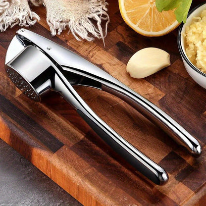 A multifunctional stainless steel garlic press that can be used as a garlic mincer, crusher, chopper, squeezer, masher, and more. Washable and great for use in the kitchen, this gadget is a must-have for any cooking enthusiast.