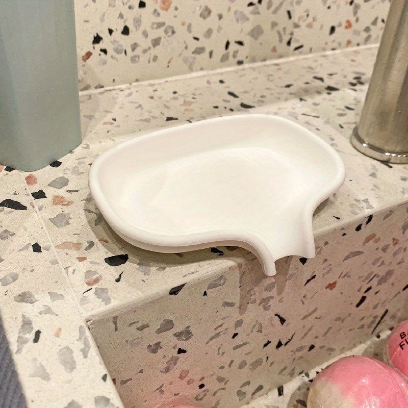 Simple soap dish for bathroom with minimalist design to hold and drain soap.