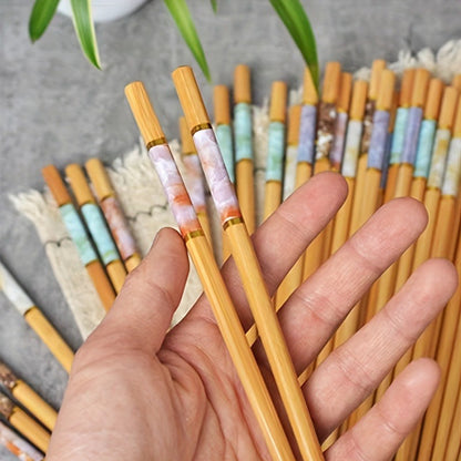 Family set of 5 pairs of bamboo crackle print chopsticks, perfect for Chinese cuisine.