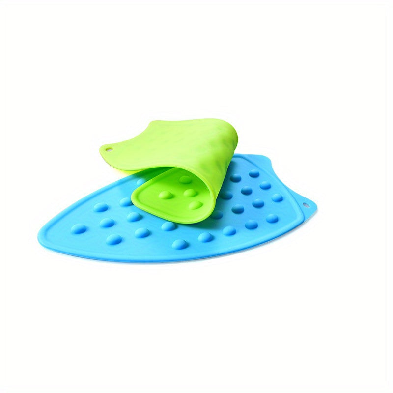 1 piece of Silicone Ironing Pad, featuring a solid color and heat-insulated design. This foldable mat is also waterproof, non-slip, and thickened for added durability. Perfect for apartments, college dorms, and back-to-school needs. A must-have for home