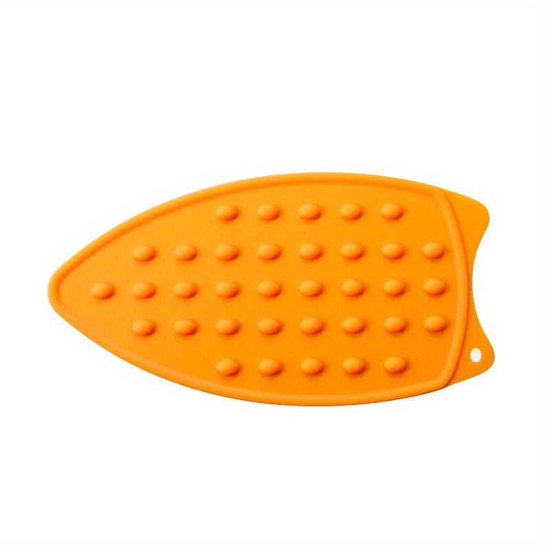 1 piece of Silicone Ironing Pad, featuring a solid color and heat-insulated design. This foldable mat is also waterproof, non-slip, and thickened for added durability. Perfect for apartments, college dorms, and back-to-school needs. A must-have for home