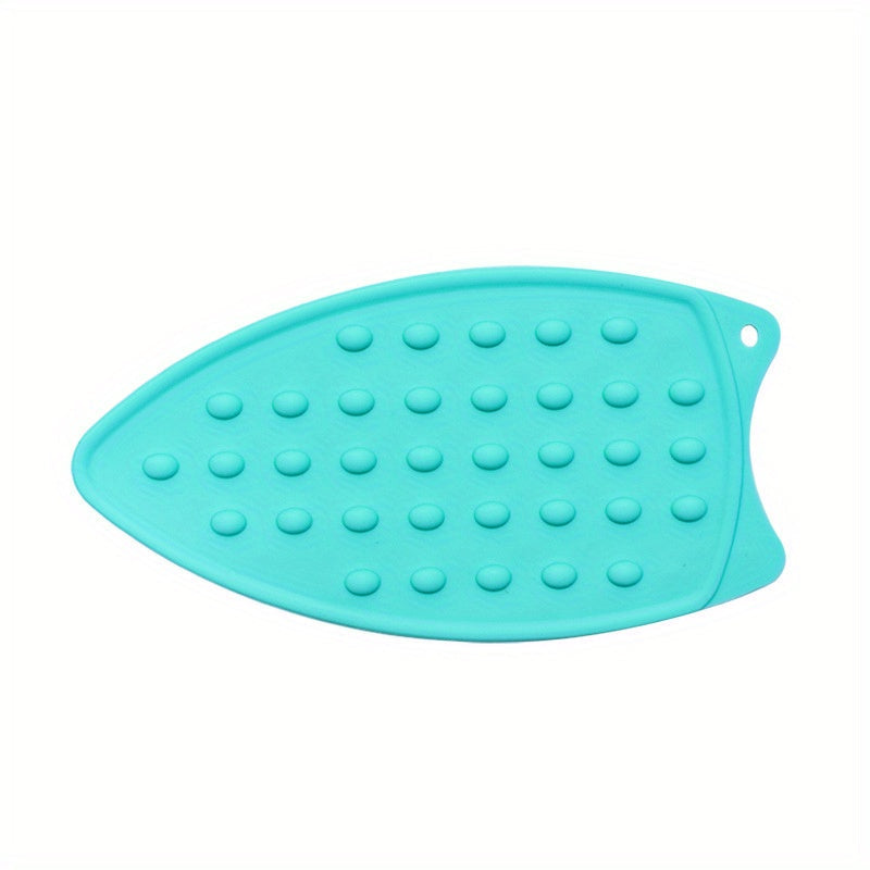 1 piece of Silicone Ironing Pad, featuring a solid color and heat-insulated design. This foldable mat is also waterproof, non-slip, and thickened for added durability. Perfect for apartments, college dorms, and back-to-school needs. A must-have for home