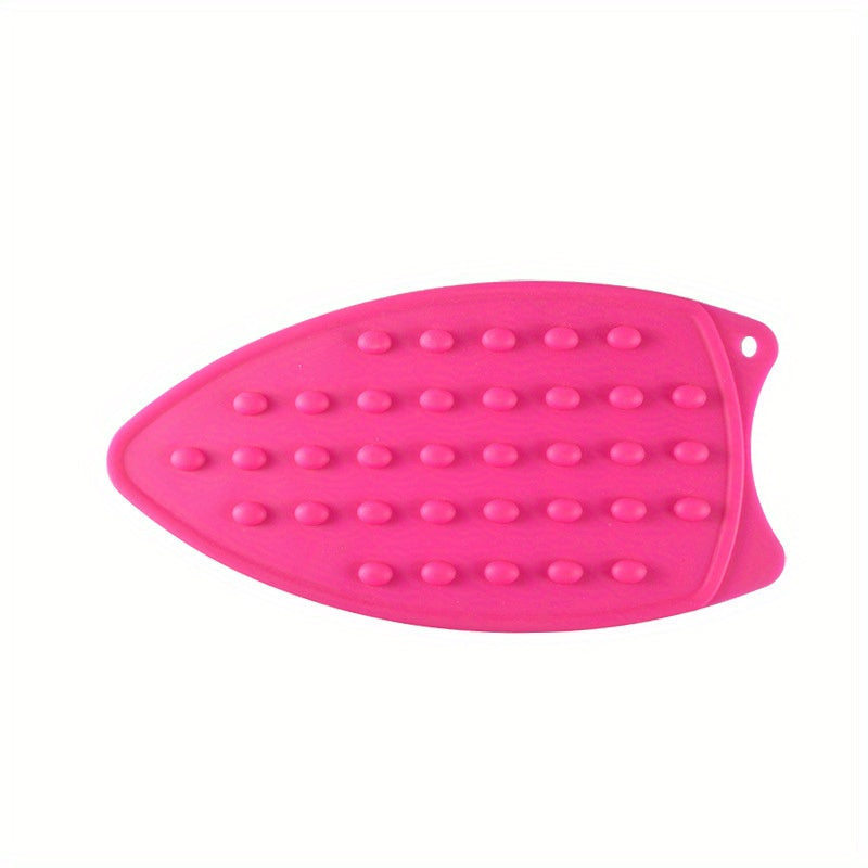 1 piece of Silicone Ironing Pad, featuring a solid color and heat-insulated design. This foldable mat is also waterproof, non-slip, and thickened for added durability. Perfect for apartments, college dorms, and back-to-school needs. A must-have for home