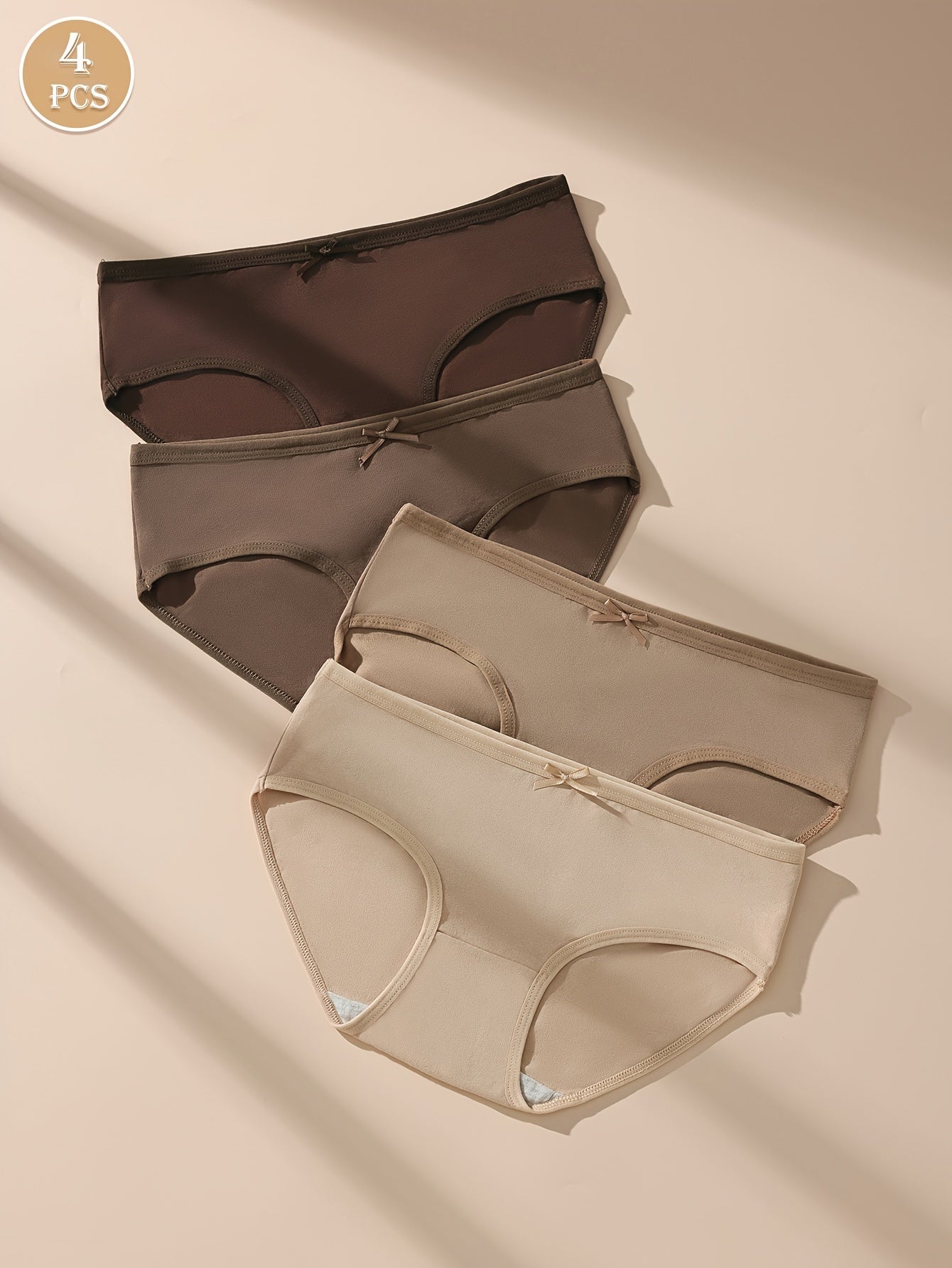 4 Maillard Color briefs for women in beige, brown, and nude shades. Sexy, comfortable, and breathable with bow detail and stretchy, non-see-through fit.