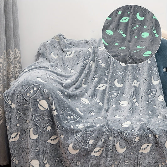 Soft flannel throw blanket featuring a glow in the dark space and rocket design, perfect for boys and girls. Ideal birthday gift with a soft star spaceship and planets design. Perfect for adding a touch of outer space to your living room or bedroom decor