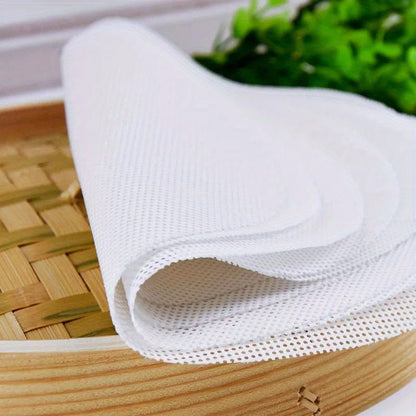 The Household Non Stick Steamer Mat Set includes 3 pieces, including a Mantou Mat, Cage Drawer Steamer Cloth, and Coarse Gauze Food Kitchen Cage Cloth. These mats are perfect for multi-functional cooking and are easy to clean.