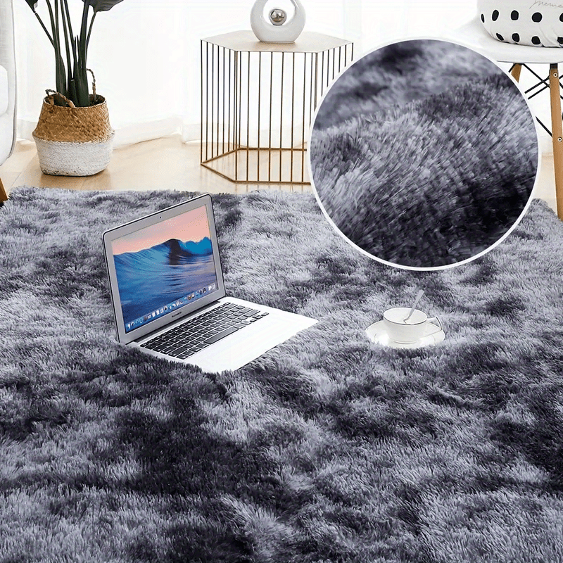 Luxurious non-slip dark gray carpet with a cute and soft fluffy shag design, perfect for living rooms and bedrooms. Machine washable and ideal for adding a touch of luxury to home decor.