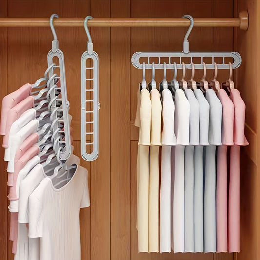 Space-saving multi-hole clothes hanger for home, dorm, and travel - foldable drying rack for trousers, shirts, and skirts, also doubles as a shower caddy.