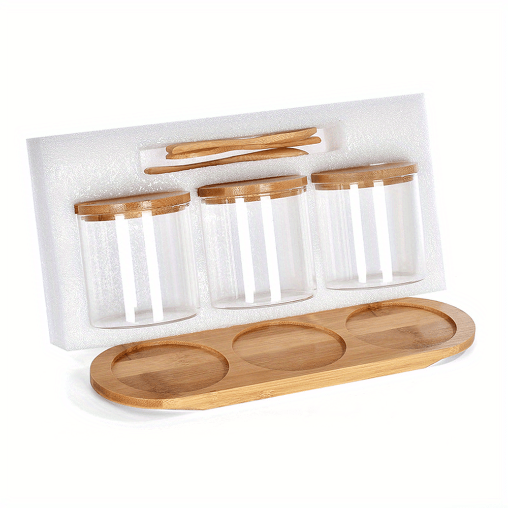 Set of 3 seasoning pots for your kitchen, including spice, monosodium glutamate, salt, and pepper jars with tray. These creative containers come with lids for easy seasoning storage, and a food storage box with spoons. Perfect for keeping your kitchen