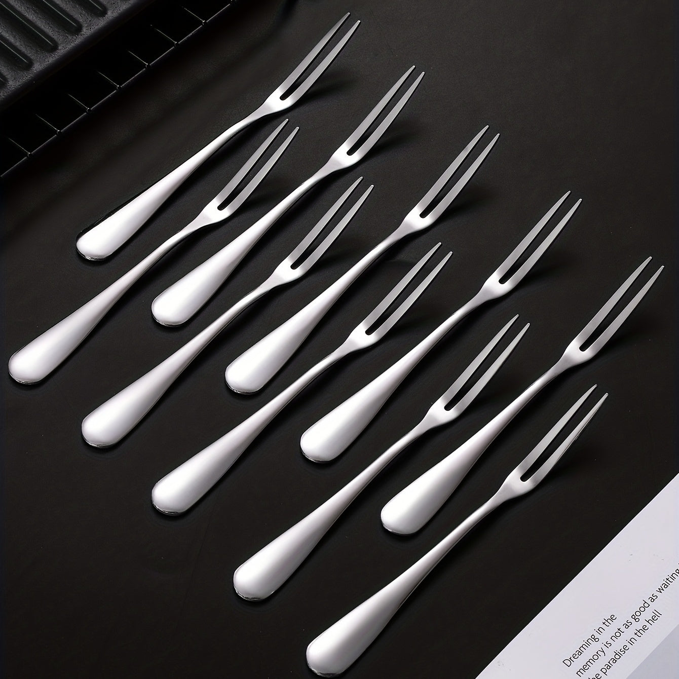 Stainless steel fruit forks for desserts and salads, modern and reusable.