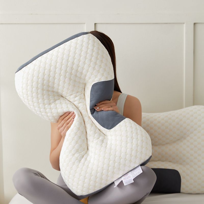 Highly elastic neck support pillow with breathable and washable cover, suitable for maternity and bedroom use.