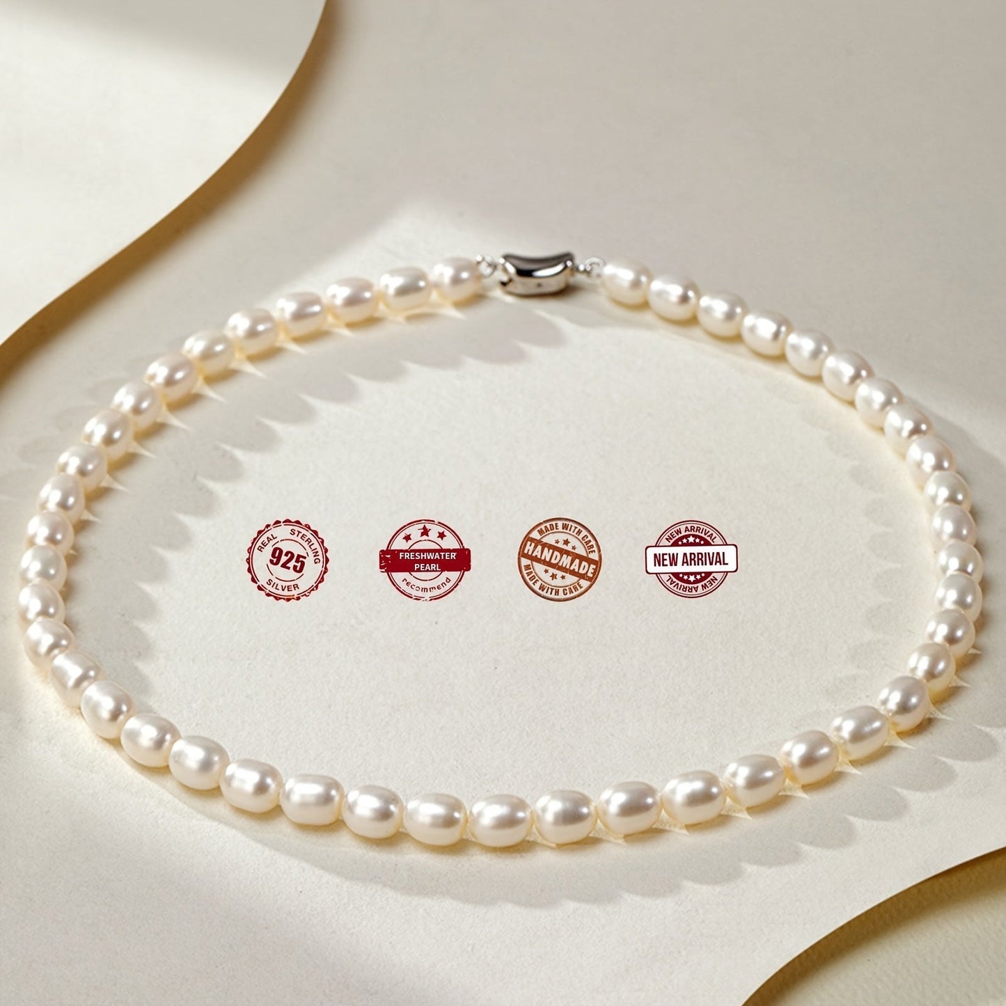 Necklace featuring freshwater pearls in rice shapes, accented with a silver-plated big natural pearl, presented in a gift box.