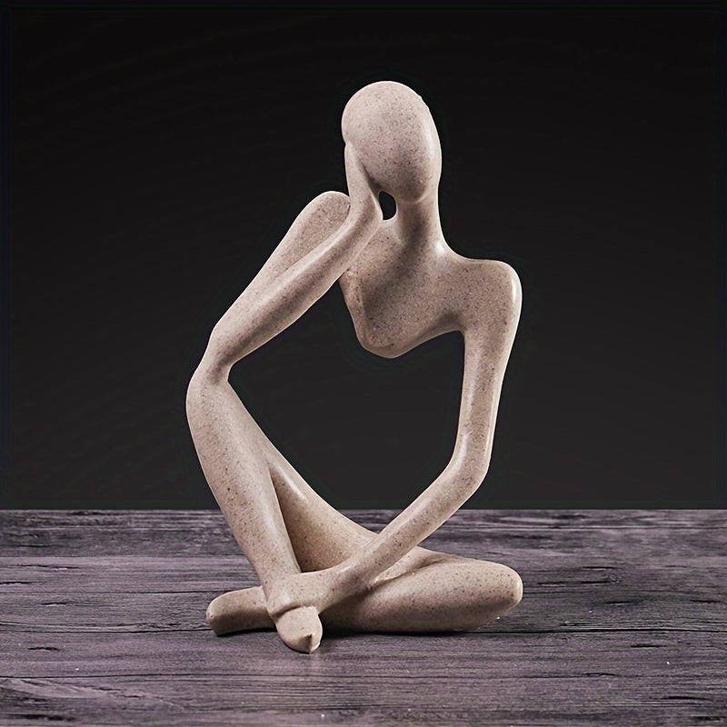 Chic, modern "The Thinker" resin sculpture for home or office decor. Perfect for living room display.