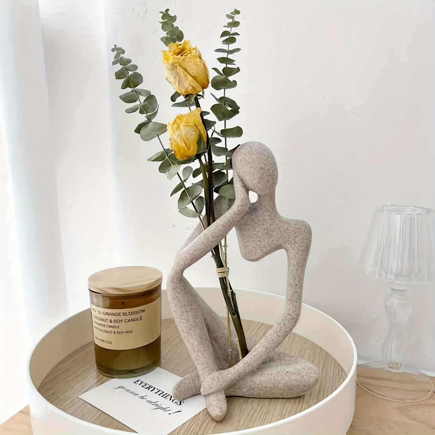 Chic, modern "The Thinker" resin sculpture for home or office decor. Perfect for living room display.