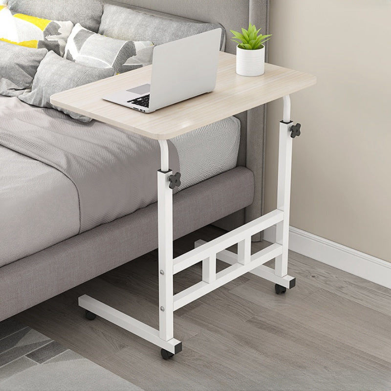 Adjustable & portable laptop desk made of sleek wood for home, sofa, or bedside use.