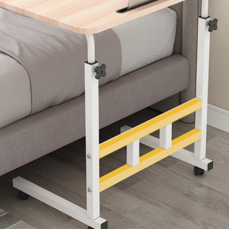 Adjustable & portable laptop desk made of sleek wood for home, sofa, or bedside use.