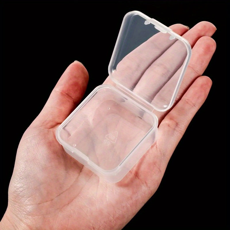 6 Mini clear plastic storage boxes with snap lids, ideal for organizing jewelry, earrings, and small items. Perfect for modern home decor and secure storage.