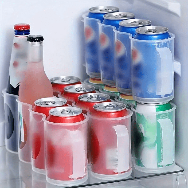 Clear plastic storage box with 4 compartments for soda cans, ideal for organizing your kitchen countertops, cabinets, and refrigerator. A convenient and portable solution for keeping your kitchen organized.